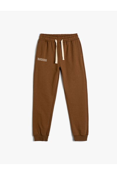 Koton Slogan Printed Jogger Sweatpants - with Pockets and Waist Laces