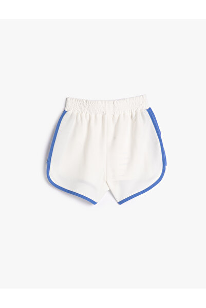 Koton Színblokkoló futónadrág címke részlete