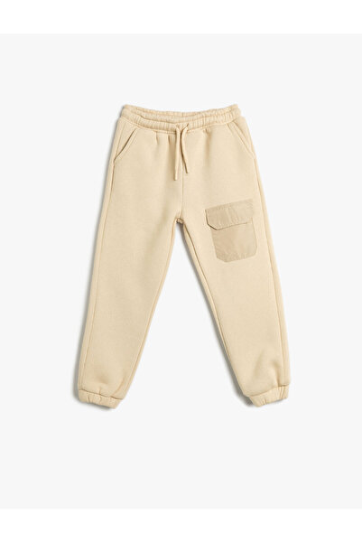 Koton Basic Jogger Sweatpants with Tie Waist Pocket Detail and Ribbon