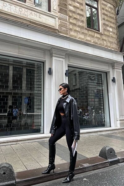 Eka Жіноча чорна шкіряна куртка на кнопках 0999-21009