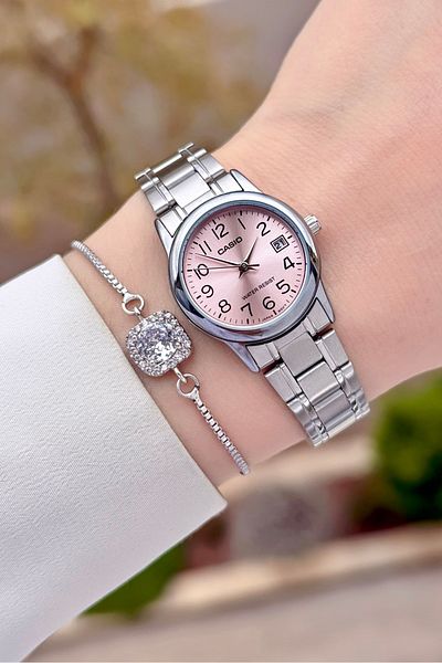 Casio Pink Dial Women's Wristwatch with Metallic Color