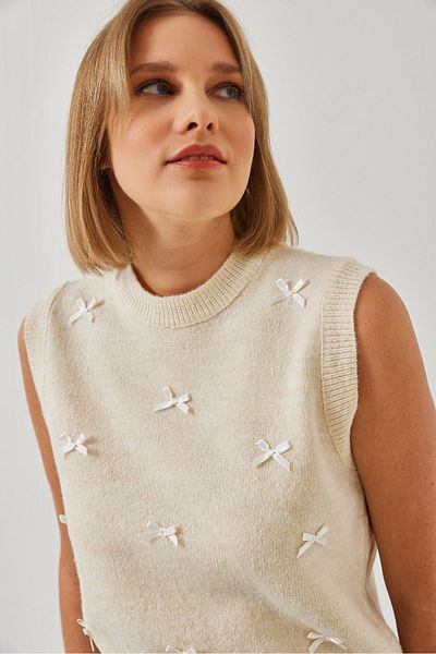 Bianco Lucci Sweter damski z kokardą 20246910