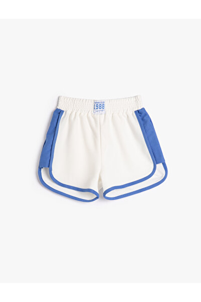 Koton Színblokkoló futónadrág címke részlete