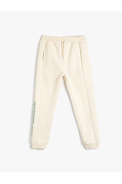 Koton Basic-Jogger-Jogginghose mit Bindegürtel und bedrucktem Taschenband