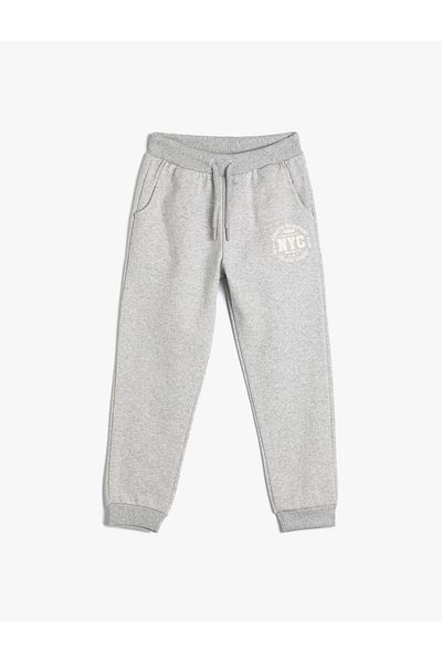 Koton Pantaloni de sport de tip jogger cu panglică detaliată cu imprimeu în talie