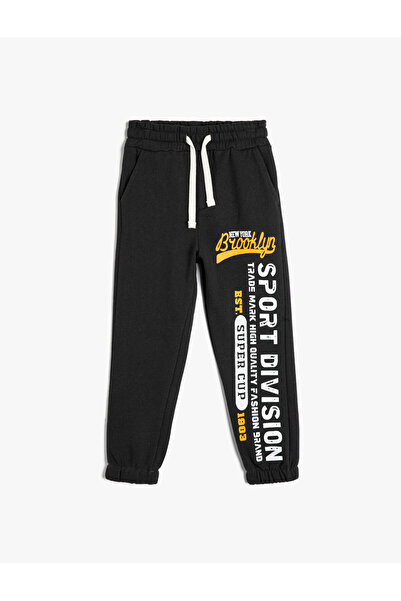 Koton Jogger Sweatpants εμπριμέ με δέσιμο τσέπης στη μέση ανασηκωμένη βαμβακερή