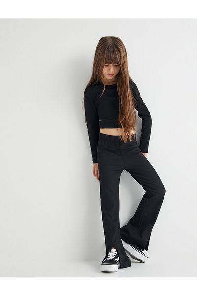 Koton Flared Leg Trousers with Ribbed Slit Detail and Elastic Waist