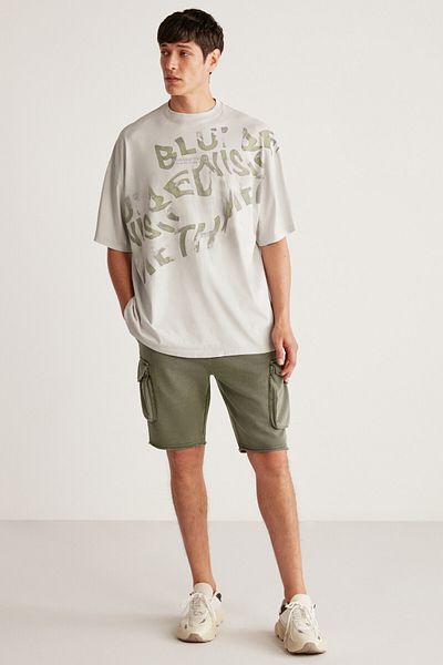 GRIMELANGE Μπλουζάκι Bowie Oversize Fit Print Λεπτομερές μπλουζάκι με στρογγυλή λαιμόκοψη με κοντό μανίκι ανοιχτό γκρι