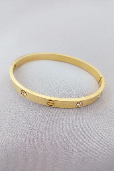 OQQO Gold Steel Bracelet with Stones
