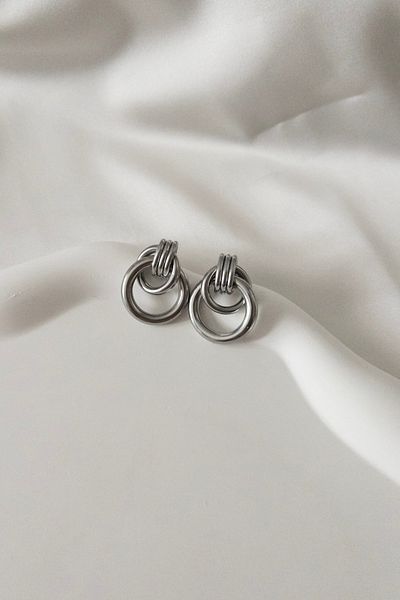 Karflake أقراط نسائية أنيقة من الفولاذ بتصميم أصلي