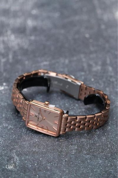 Daniel Klein DKE.1.10750 ساعة يد نسائية ذات تصميم بسيط وأرقام رومانية مستطيلة الشكل