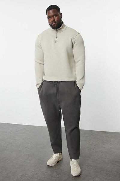 Trendyol Collection Καπνιστό sweatpants Plus Size - Κανονική εφαρμογή με λεπτομέρεια ραφής TMNAW25AJ00009