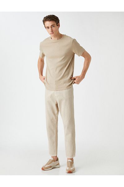 Koton Basic-Gabardine-Hose mit Knopfdetail und Taschen
