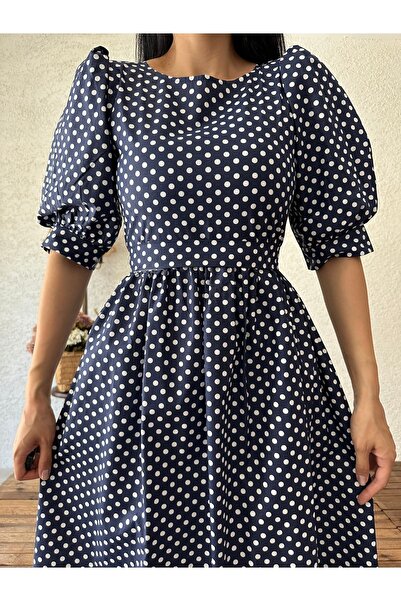 KÜÇÜĞÜM BUTİK Темно-синя сукня в горошок з кавуновим рукавом
