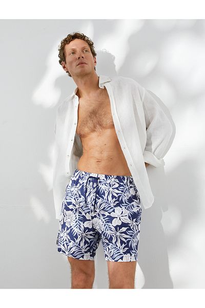 Koton Badeshorts mit Blumenmuster und Taschen am Bund