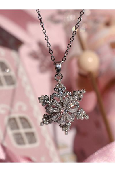 Reorah Collection The Magic of Winter Fidget Steel Necklace- Snowflake Rotating Steel Necklace with Pearls