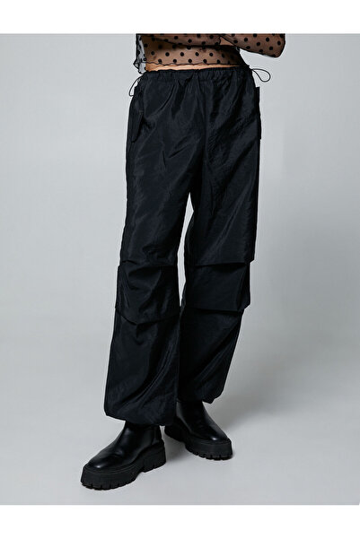 Koton Padákové kalhoty s detailem kapsy, zátkou a zapínáním na patentku