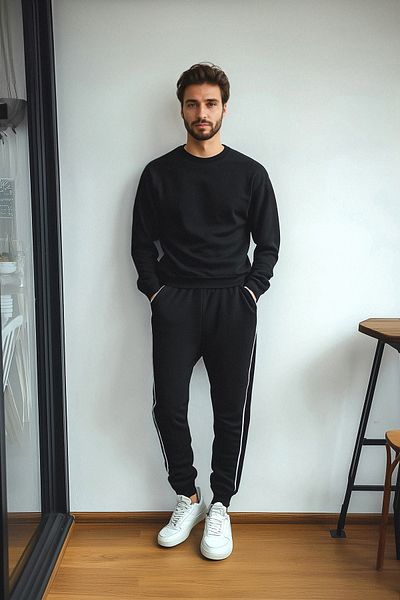 Trendyol Collection Czarne grube spodnie dresowe z lamówką - krój regularny TMNAW25EA00001