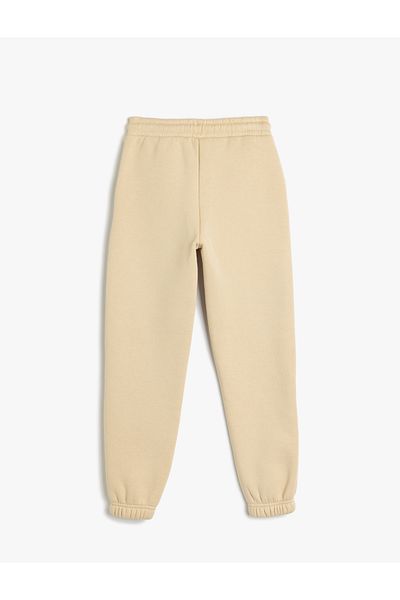 Koton Ribbed Jogger Sweatpants with Tie-Up Waist and Pocket Detail