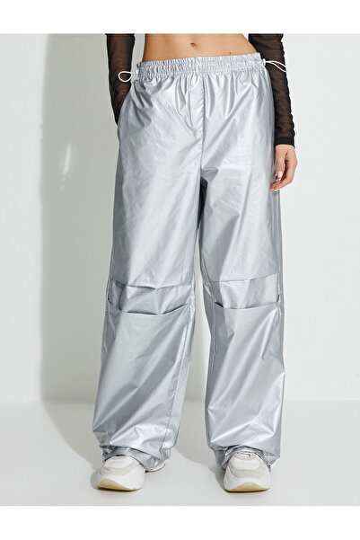 Koton Padákové tepláky s elastickým pasem, zarážkami, kapsami, vodoodpudivými prvky