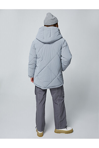 Koton Негабаритні надувні пальто з капюшоном і стьобаними кишенями Детальніше