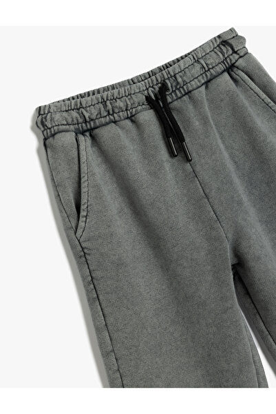 Koton bawełniane spodnie dresowe - sznurowane w pasie i z kieszeniami