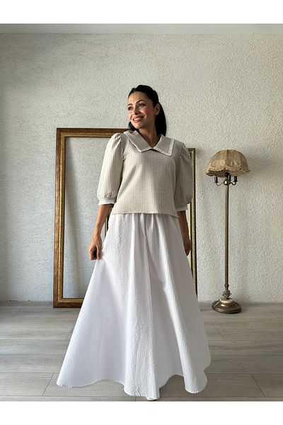 KÜÇÜĞÜM BUTİK بلوزة مخططة بلون كريمي