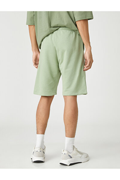 Koton Základní šortky s krajkovým pasem s potištěnými kapsami s logem štítku