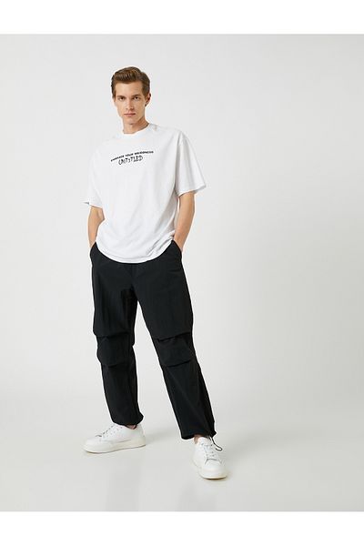 Koton Fallschirmhose, locker geschnittene Taille, Schnürung an den Beinen, elastische Tasche, detailliert