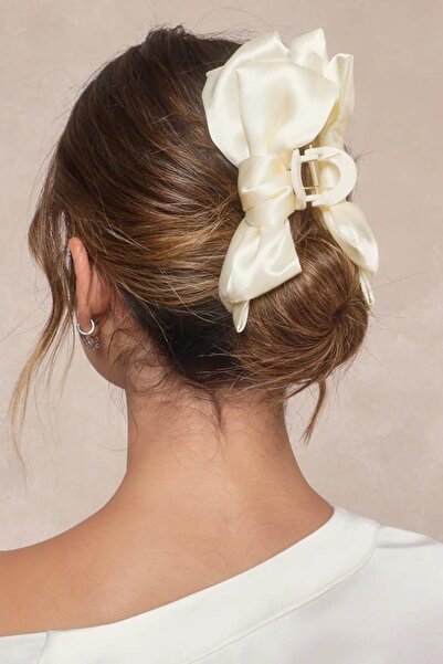 New Obsessions مشبك شعر على شكل فيونكة