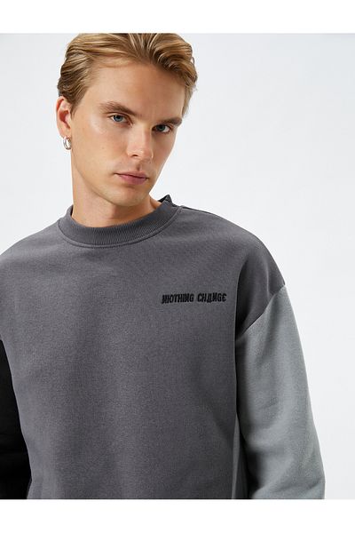 Koton Color-Blocking Crew Neck Sweatshirt - Slogan Embroidered and Ribbed