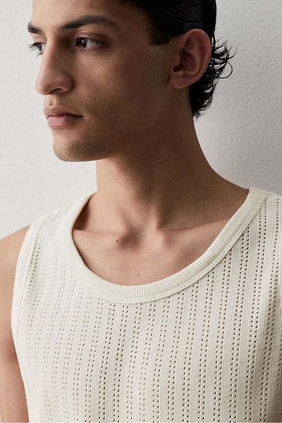 H&M قميص جيرسي Pointelle ذو قصة ضيقة
