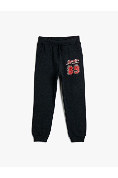 Koton Βασικό φούτερ Jogger με λεπτομέρεια εκτύπωσης αθλητικού θέματος κορδέλα...