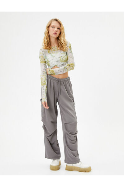 Koton بنطال رياضي مريح مع جيوب وربطة خصر وتفاصيل أرضية