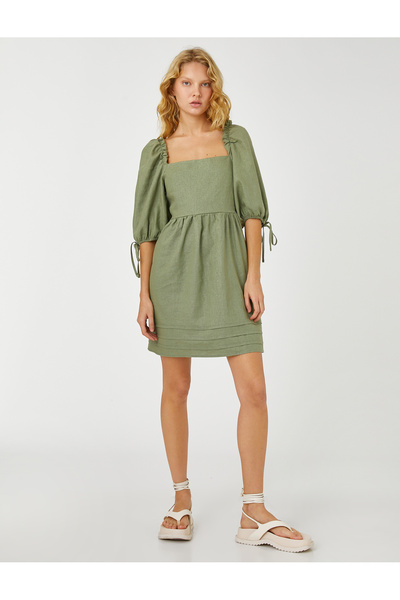 Koton Μίνι λινό φόρεμα με μπαλόνι μανίκια τετράγωνη λαιμόκοψη Αναλυτικά