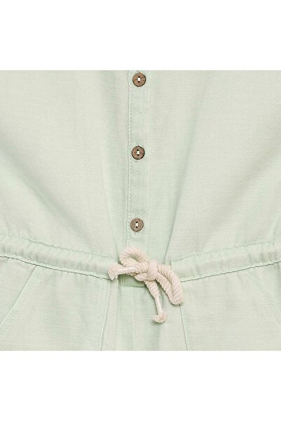 KIABI Straight-cut playsuit GREEN