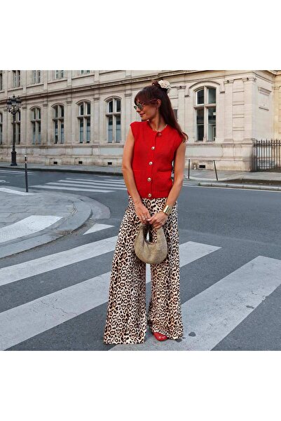 KIABI بنطلون واسع الساق منقوش بنقشة جلد النمر باللون البيج