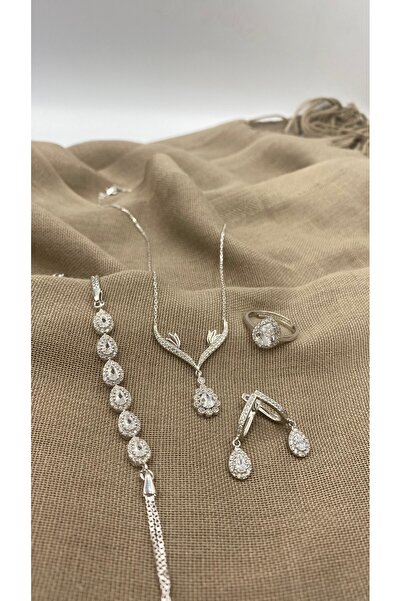 SURA SILVER ZİRKON TAŞ BEYAZ RODYUM DAMLA MODEL 925 AYAR GÜMÜŞ SET (KOLYE,BİLEKLİK,KÜPE VE AYARLANABİLİR YÜZÜK)