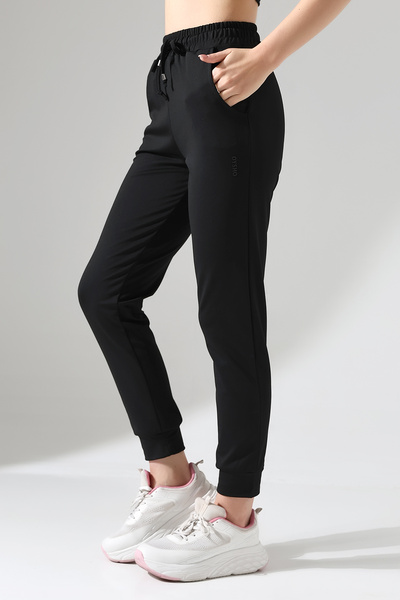 Gugus Γυναικεία θερμική/πολική φόρμα με διπλές τσέπες και μανσέτες στο πόδι