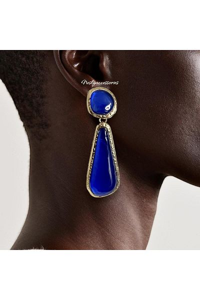 neslyaccessories حلق طويل من الراتنج بحافة ذهبية
