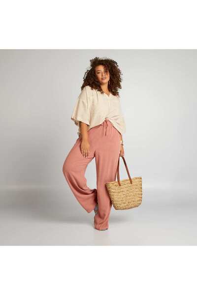 KIABI بنطلون واسع الساق مع خصر مطاطي باللون الوردي