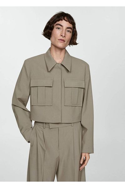 MANGO Woman Κοντό μπουφάν με τσέπες