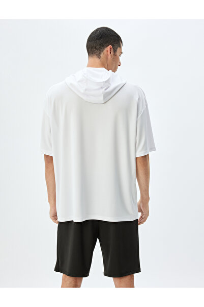 Koton Sportovní tričko oversize s kapucí a potiskem – poloviční rukáv