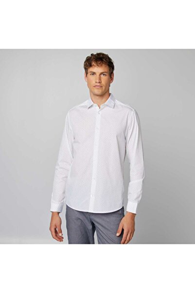 KIABI قميص منقط بقصّة عادية باللون الأبيض