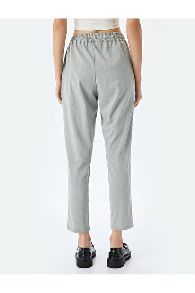 Koton Yüksek Bel Beli Bağcıklı Lastikli Cepli Kumaş Pantolon