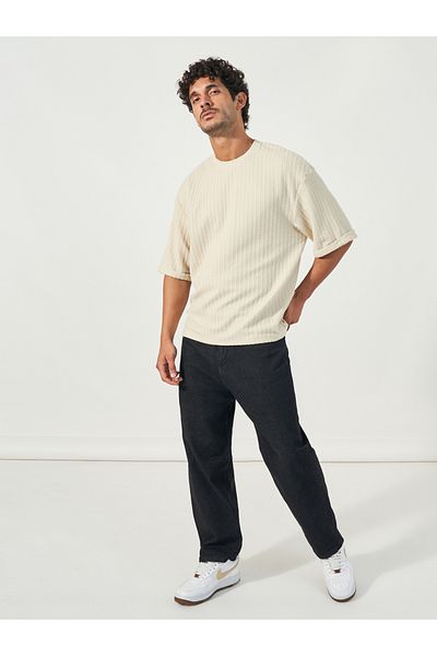 Styli Seersucker Textured Knit Boxy Fitted T-Shirt with Turn-Up Sleeves