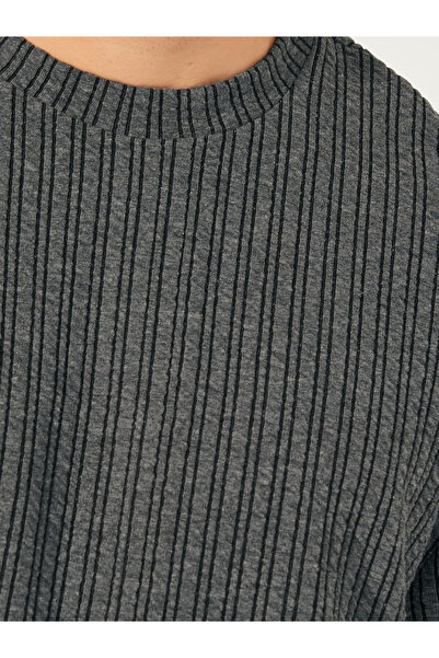 Styli Seersucker Textured Knit Boxy Fitted T-Shirt with Turn-Up Sleeves