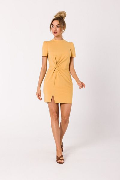Made of Emotion A mini dress with a twist cut in cotton based fabric - a necessary summer outfit.