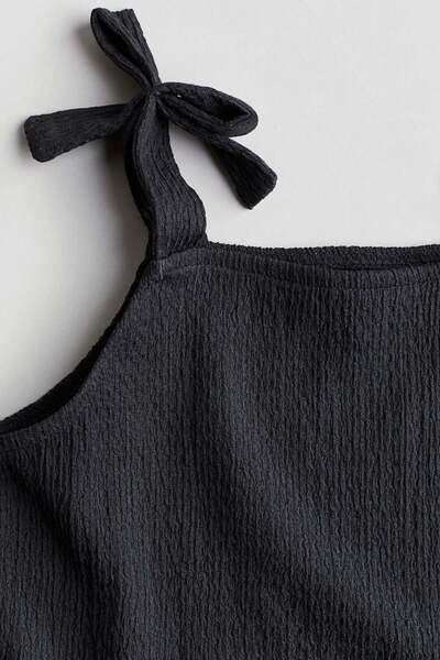 H&M Bow-detail peplum top
