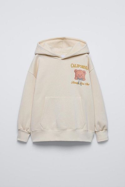 The Champ Clothing Μπεζ παιδικό αρκουδάκι με στάμπα Καλιφόρνια Friendly Bear Club Written Kangaroo Pocket Oversize Hooded Sweat